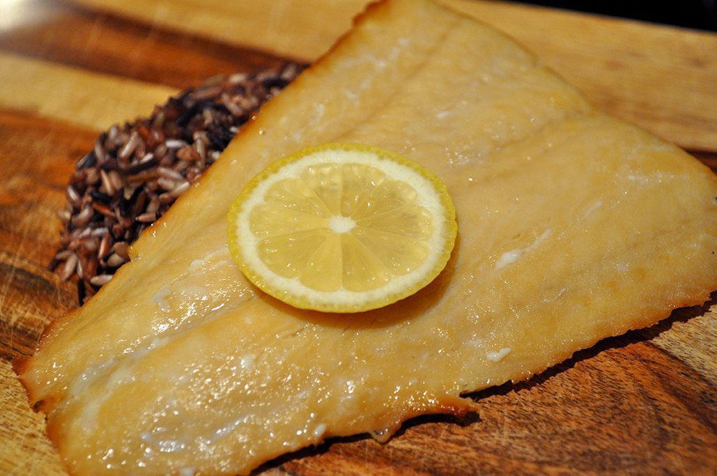 Smoked lingcod on a cutting board